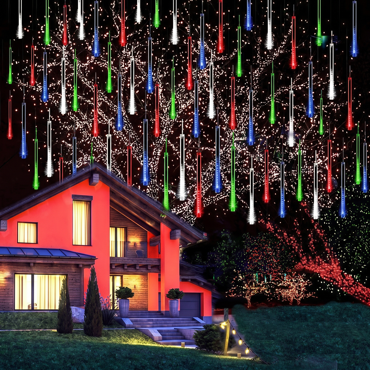 Mehrfarbige Meteorschauer-Lichterkette in einem Baum vor einem beleuchteten Haus